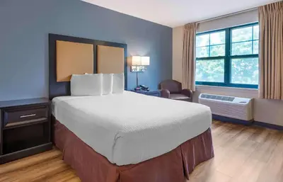 a bedroom with a large bed in a hotel room at Extended Stay America Suites - Philadelphia - Cherry Hill in Maple Shade