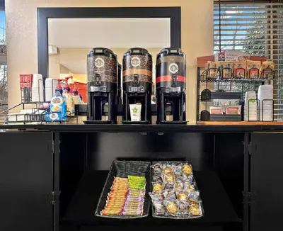 a shelf with drinks and snacks on it at Extended Stay America Suites - Philadelphia - Airport - Bartram Ave in Philadelphia