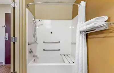 a shower in a bathroom with a white shower curtain at Extended Stay America Suites - Philadelphia - Mt Laurel - Pacilli Place in Mount Laurel