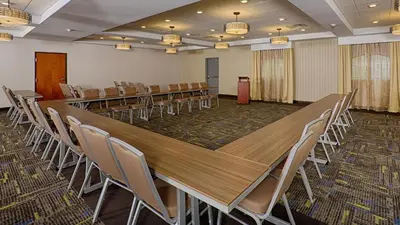 a conference room with a long table and chairs at Holiday Inn Express Bordentown - Trenton South by IHG in Bordentown