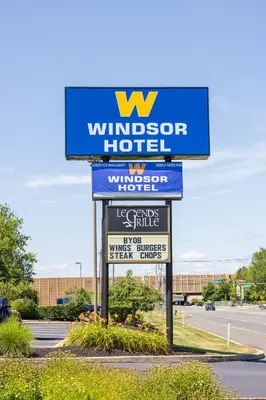 a sign for a windsor hotel on a street at Windsor Hotel in East Windsor