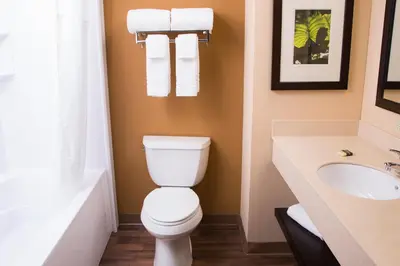 a bathroom with a toilet and a sink at Extended Stay America Suites - Philadelphia - Bensalem in Bensalem