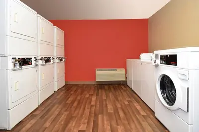 a laundry room with a washer and dryer at Extended Stay America Suites - Philadelphia - Bensalem in Bensalem