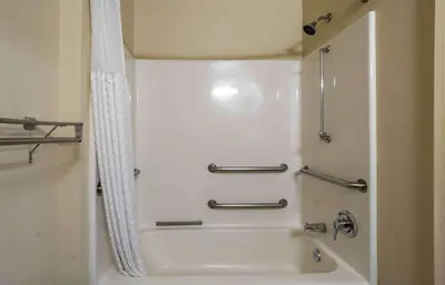 a bath tub in a bathroom with a shower at Extended Stay America Suites - Somerset - Franklin in Somerset