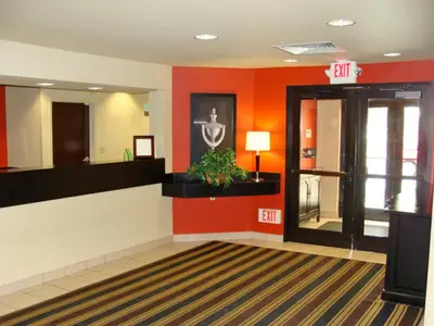a lobby with a waiting room with a exit door at Extended Stay America Suites - Somerset - Franklin in Somerset