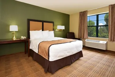 a hotel room with a large bed and a window at Extended Stay America Select Suites - Philadelphia - Malvern - Great Valley in Malvern