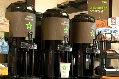 a group of bottles of coffee on a shelf at Extended Stay America Suites - Philadelphia - Horsham - Welsh Rd in Horsham