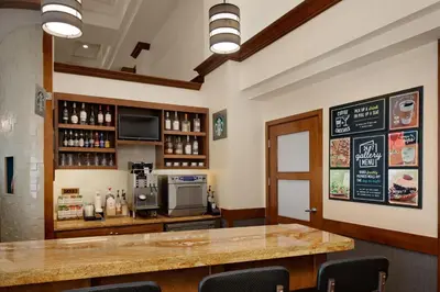 a bar in a restaurant with a counter at Hyatt Place Princeton in Princeton