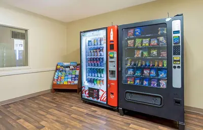a soda vending machine in a room at Extended Stay America Suites - Meadowlands - Rutherford in Rutherford