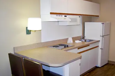 a small kitchen with a sink and a refrigerator at Extended Stay America Suites - Philadelphia - Horsham - Dresher Rd in Horsham