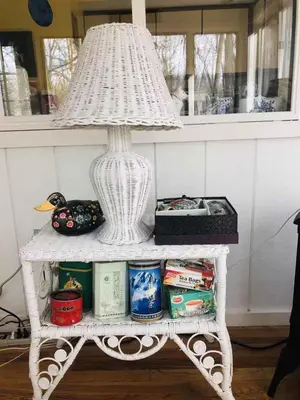 a white table with a lamp on top of it at My Little Flagship Cabin in East Stroudsburg