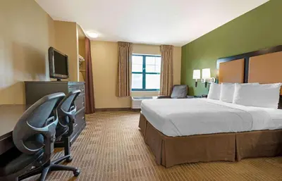 a hotel room with a bed and a television at Extended Stay America Suites - Secaucus - Meadowlands in Secaucus