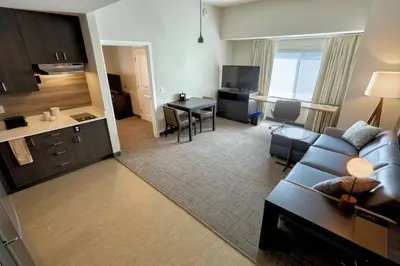 a living room with a couch and a table at Residence Inn by Marriott Harrisburg North in Harrisburg