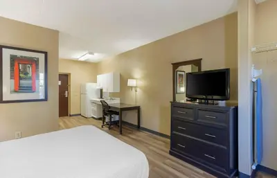 a bedroom with a bed and a tv and a desk at Extended Stay America Suites - Philadelphia - Airport - Tinicum Blvd in Philadelphia
