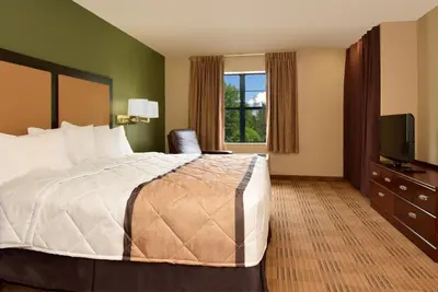 a hotel room with a bed and a television at Extended Stay America Suites - Philadelphia - Airport - Tinicum Blvd in Philadelphia