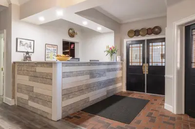 a kitchen with a wooden counter top in a house at Brandywine River Hotel in Chadds Ford