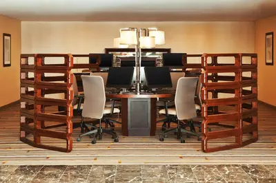 a conference room with a table and chairs at Sheraton Valley Forge King of Prussia in King of Prussia