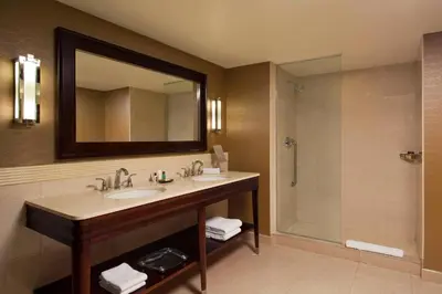 a bathroom with a sink and a shower at Sheraton Valley Forge King of Prussia in King of Prussia