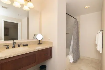 a bathroom with a sink and a mirror at Nassau Inn in Princeton