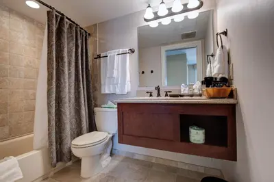 a bathroom with a toilet and a sink at Nassau Inn in Princeton