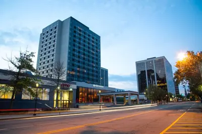 an empty street in a city with tall buildings at Hyatt Regency Morristown in Morristown