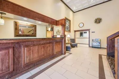 a lobby with a large wooden bar in a building at Econo Lodge Quakertown in Quakertown