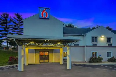 a hotel with a sign on the front of a building at Motel 6-Gordonville, PA - Lancaster PA in Gordonville