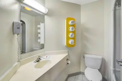 a bathroom with a sink and a toilet and a mirror at Motel 6-Gordonville, PA - Lancaster PA in Gordonville