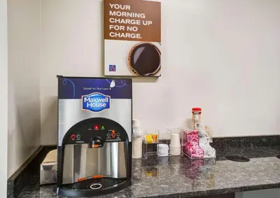 a coffee maker sitting on top of a counter at Motel 6-Gordonville, PA - Lancaster PA in Gordonville