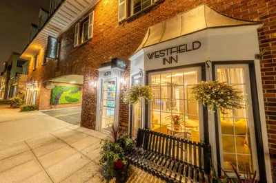 a building with a sign that reads westfield inn at The Westfield Inn, BW Signature Collection in Westfield