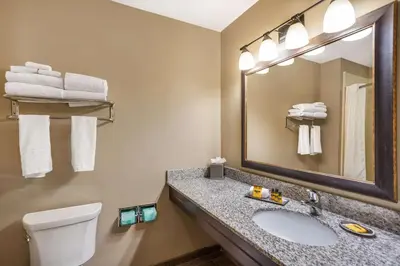 a bathroom with a sink and a mirror at Best Western Plus Intercourse Village Inn in Intercourse