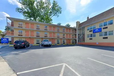 a parking lot in front of a hotel at Media Inn & Suites in Media