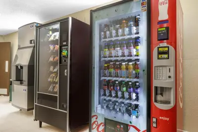 a soda vending machine in a store with drinks at FairBridge Inn Express Nyack in Nyack