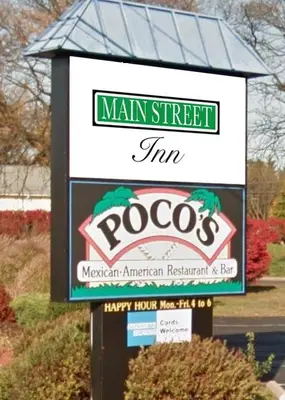 a sign for a poconos restaurant on a street at Mainstreet Inn in Doylestown