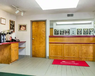 a waiting room with a counter and a cash register at Econo Lodge Mifflintown in Mifflintown
