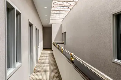 a stairway in a building with a skylight at Days Inn by Wyndham Philadelphia Convention Center in Philadelphia