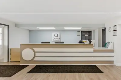 an office lobby with a waiting area with a cash register at Quality Inn Smoketown - Lancaster Area in Smoketown