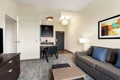 a living room with a couch and a table at Homewood Suites By Hilton Horsham Willow Grove in Horsham