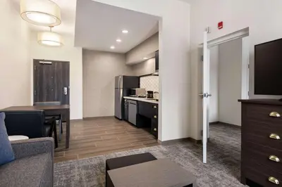 a small living room with a couch and a kitchen at Homewood Suites By Hilton Horsham Willow Grove in Horsham