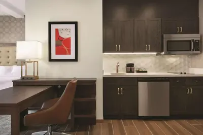 a kitchen with a desk and a microwave at Homewood Suites By Hilton Horsham Willow Grove in Horsham