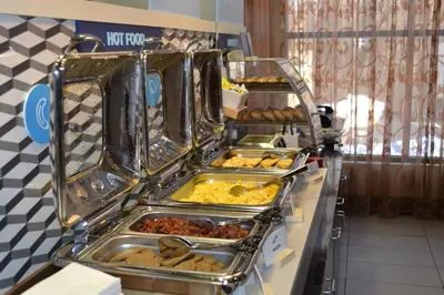 a buffet line with many different types of food at Holiday Inn Express Selinsgrove by IHG in Shamokin Dam