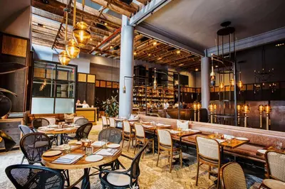 a restaurant with tables and chairs and a bar at Hyatt Union Square New York in New York