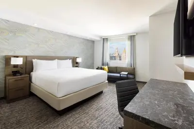 a hotel room with a bed and a desk at Residence Inn New York Downtown Manhattan/Financial District in New York