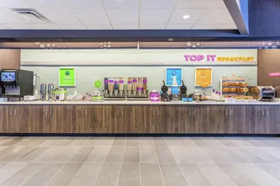 a top it service counter in a store at Tru By Hilton Binghamton Vestal in Vestal