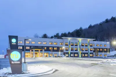 a large building with a sign in front of it at Tru By Hilton Binghamton Vestal in Vestal