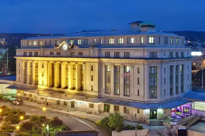 a large building with a clock on top of it at Radisson Lackawanna Station Hotel Scranton in Scranton
