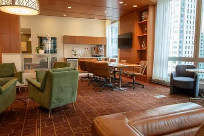 a living room with a table and chairs at Hotel Boutique at Grand Central in New York