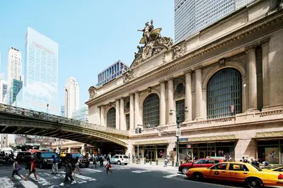 a busy city street with a building and a taxi at Hotel Boutique at Grand Central in New York