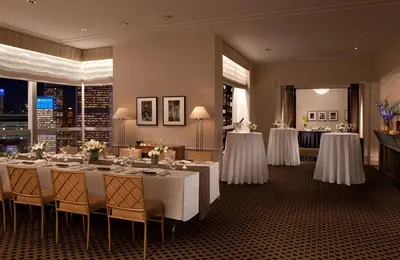 a banquet room with white tables and chairs at Millennium Hotel Broadway Times Square in New York