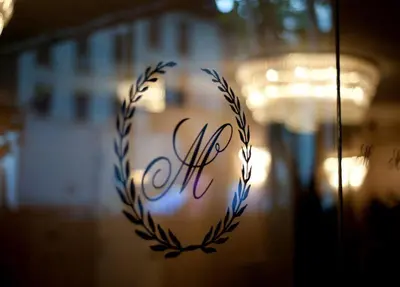 a glass door with the word alpha written on it at Murray Hill East Suites - Extended Stay in New York